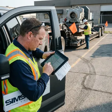 Logistics coordinator planning a specialty freight shipment
