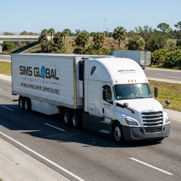 Refrigerated truck driving on a Florida highway