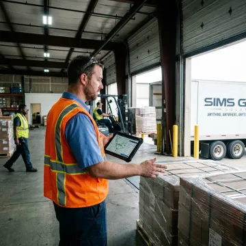 Logistics coordinator planning freight routes