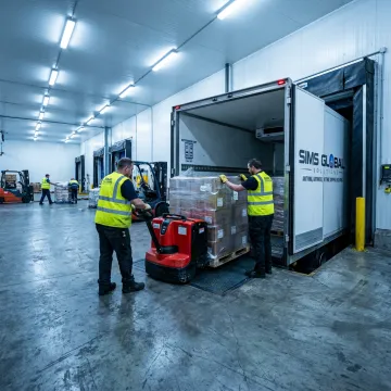 Refrigerated freight being loaded for shipment