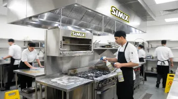 Commercial kitchen staff using SIMIX peroxide cleaner degreaser dual-action