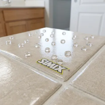 Protected tile surface with water beading