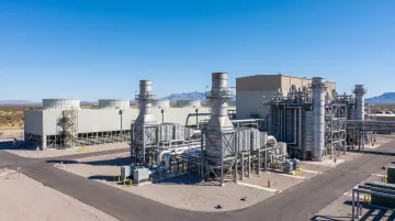 Modern H-class gas turbine power plant facility showing turbine hall and HRSG equipment