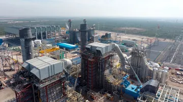 Industrial combined-cycle power plant with gas turbines and heat recovery steam generators