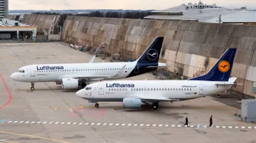 Commercial aircraft fleet showing Boeing and Airbus airliners powered by two-spool turbofan engines