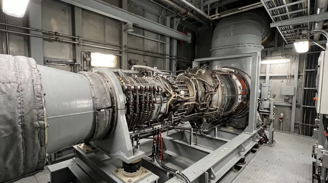 GE LM2500 marine gas turbine engine installed in naval vessel engine room