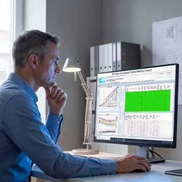 Engineer reviewing gas turbine simulation results