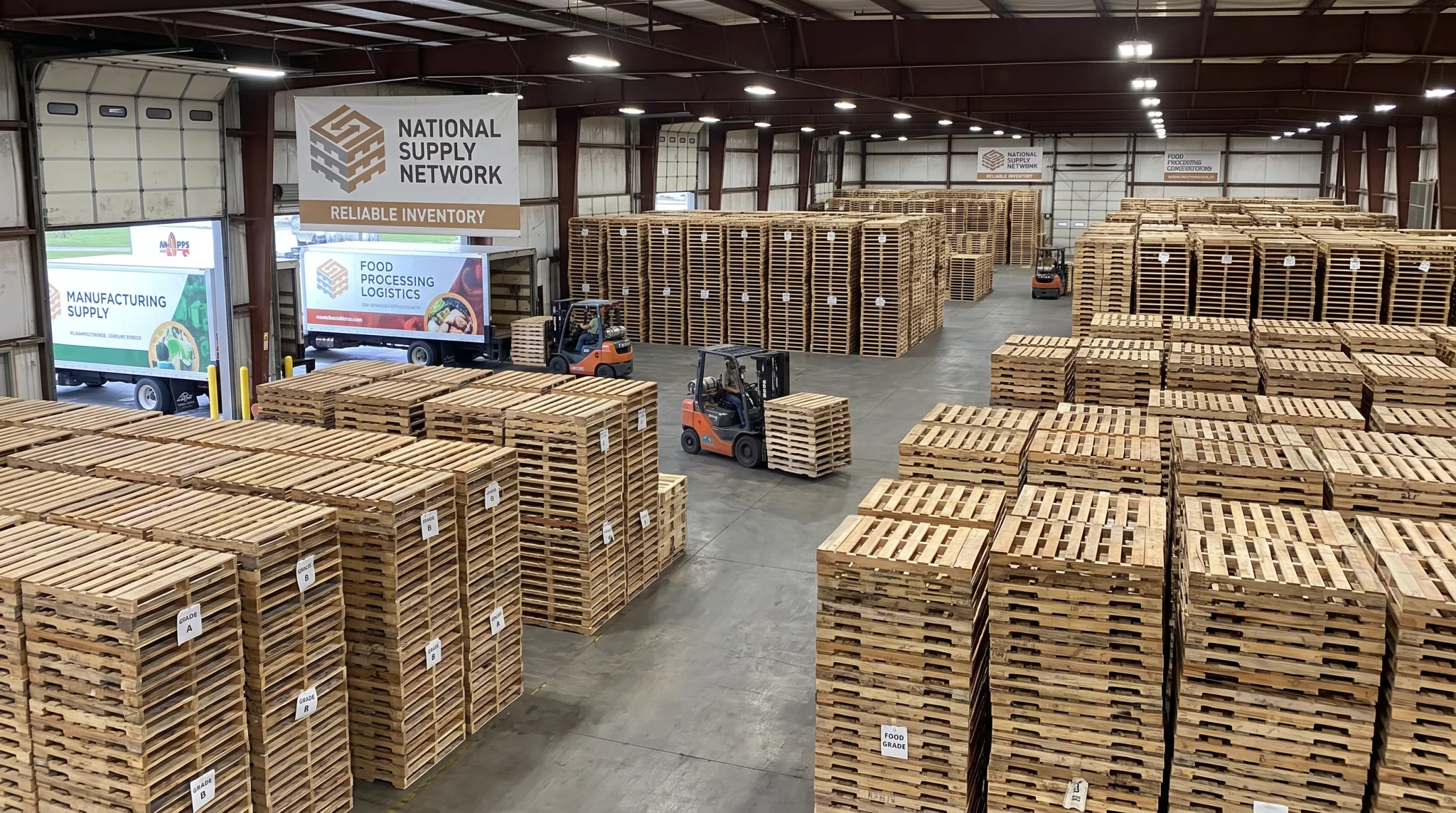 Warehouse inventory of recycled Grade A and Grade B pallets