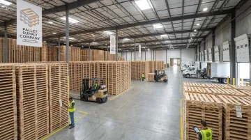 Pallet manufacturing warehouse with organized inventory and packaging materials