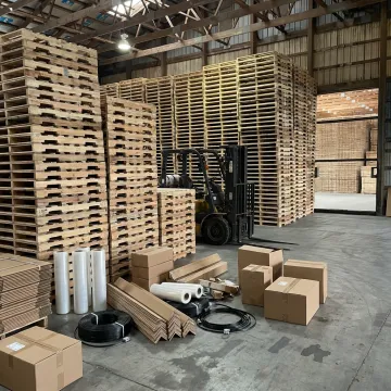 Custom wood pallets stacked in a warehouse