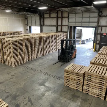Custom wood pallets at a warehouse loading dock