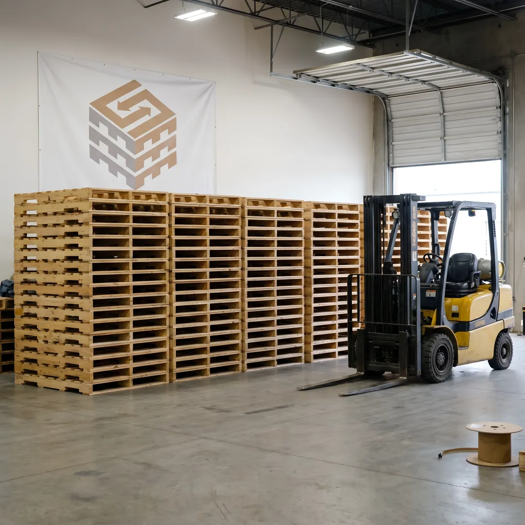 Stacks of new wood pallets ready for shipment