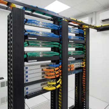 Organized structured cabling installation with labeled cables and patch panels
