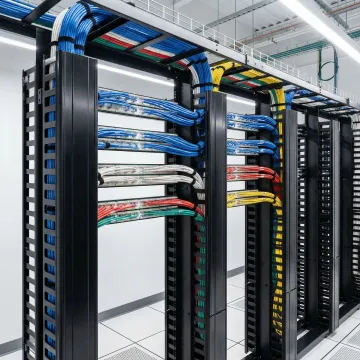 Organized network cables with proper labeling in professional server room installation