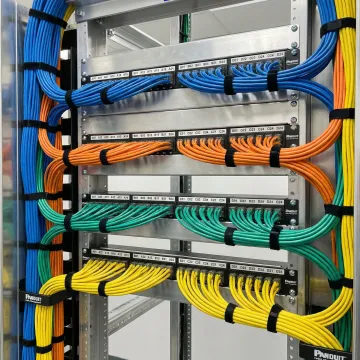 Organized network cabling infrastructure with labeled patch panels