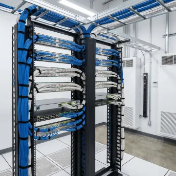 Network infrastructure rack with organized cabling and hardware in Jacksonville data center