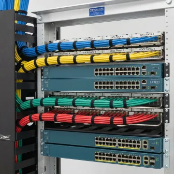 Organized network rack with structured cabling and patch panels