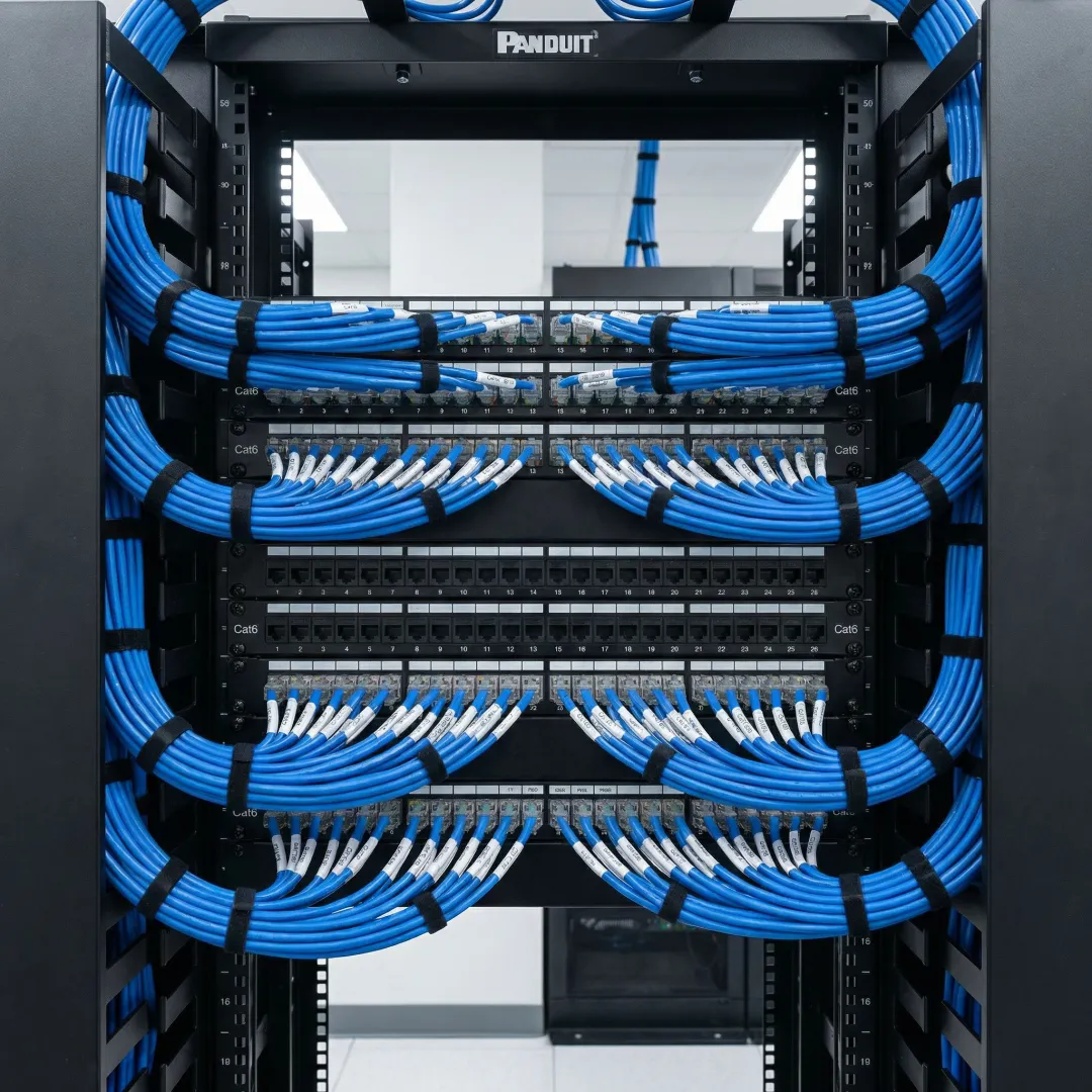 Organized network rack with labeled structured cabling and patch panels