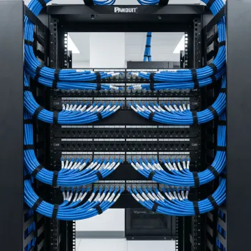 Organized network rack with labeled structured cabling and patch panels