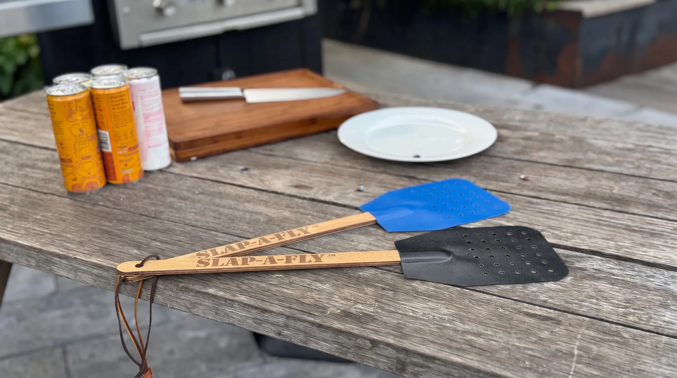 Slap-a-Fly military-grade flyswatter with aircraft spruce handle and storage loop