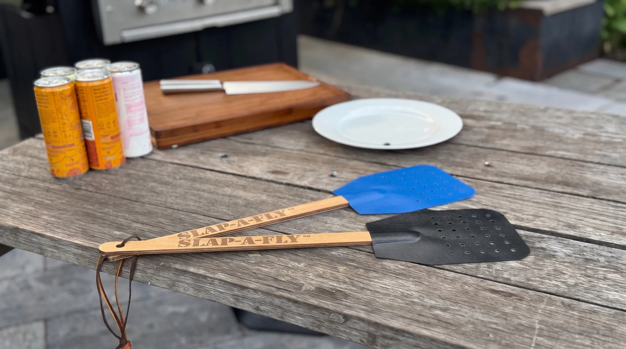 Slap-a-Fly heavy-duty swatter with mesh head and wooden handle