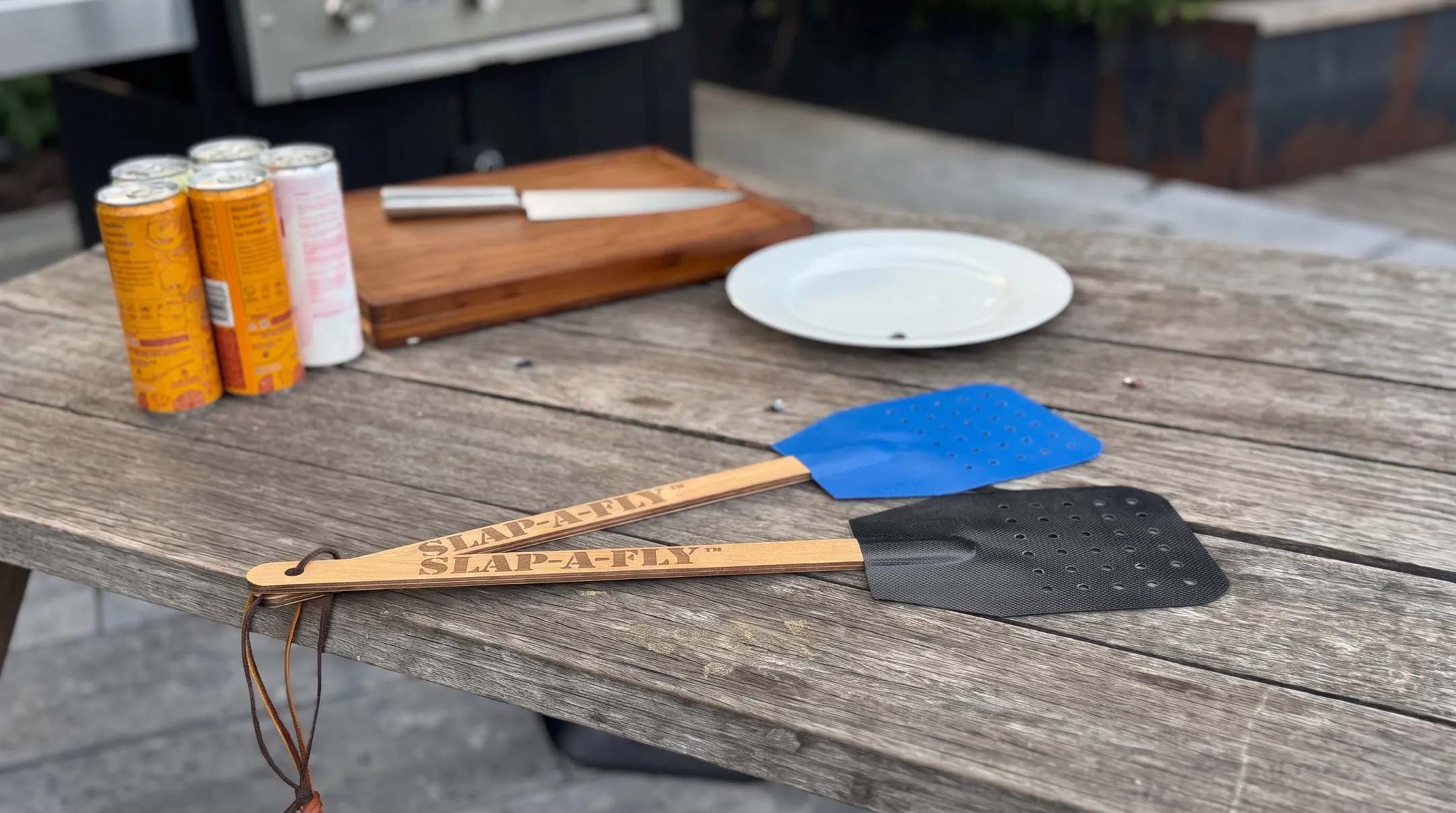Slap-a-Fly perforated Herculite 80 swatter with aircraft spruce handle