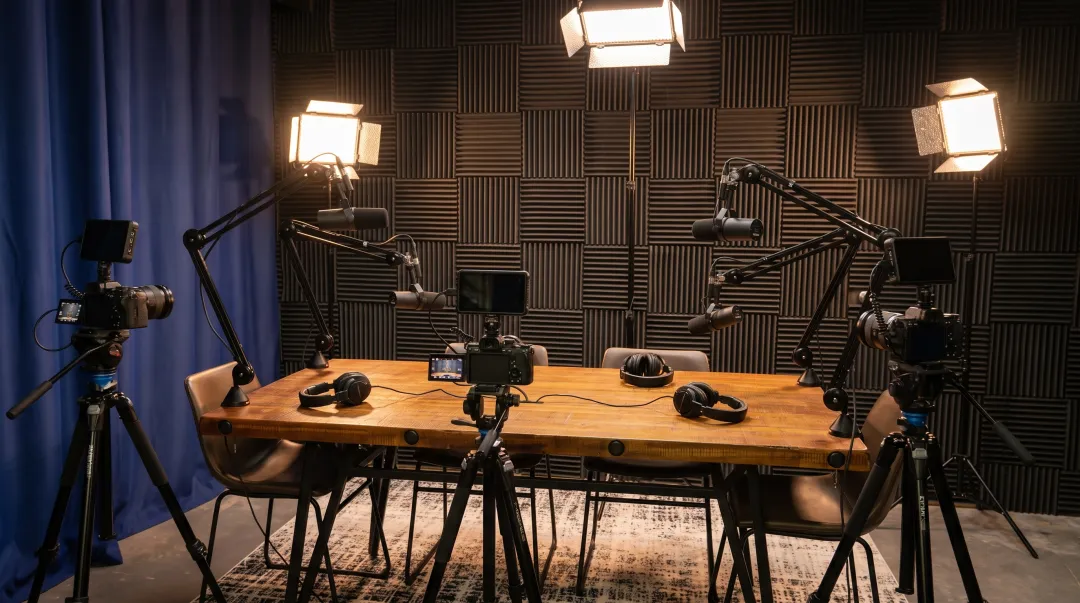 Multi-camera podcast studio setup with professional lighting and microphones
