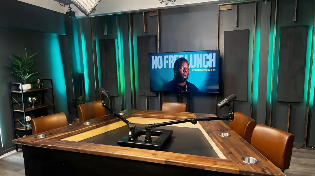 Professional content studio setup with multi-camera recording equipment and lighting