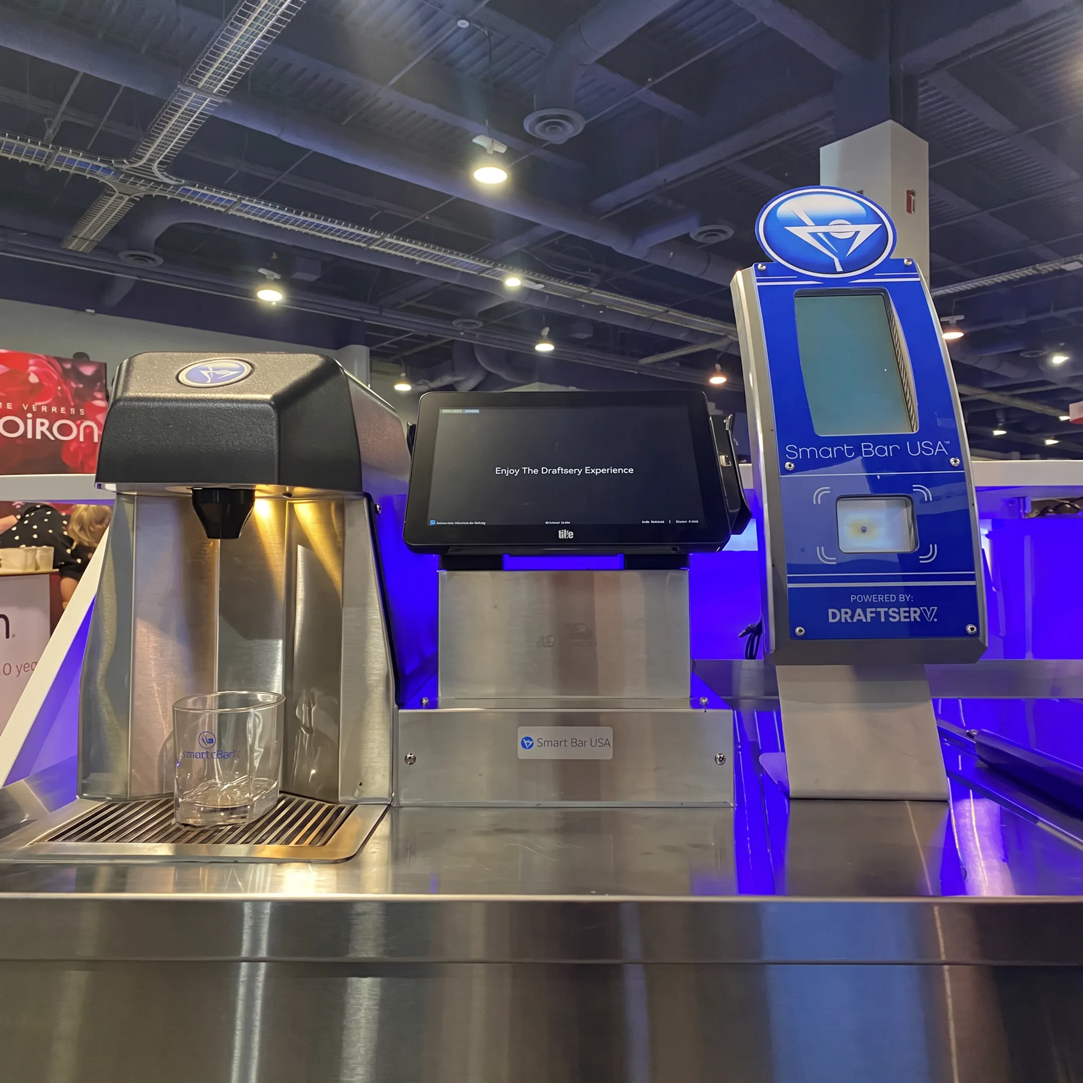 Smartender automated beverage equipment integrated into a commercial bar