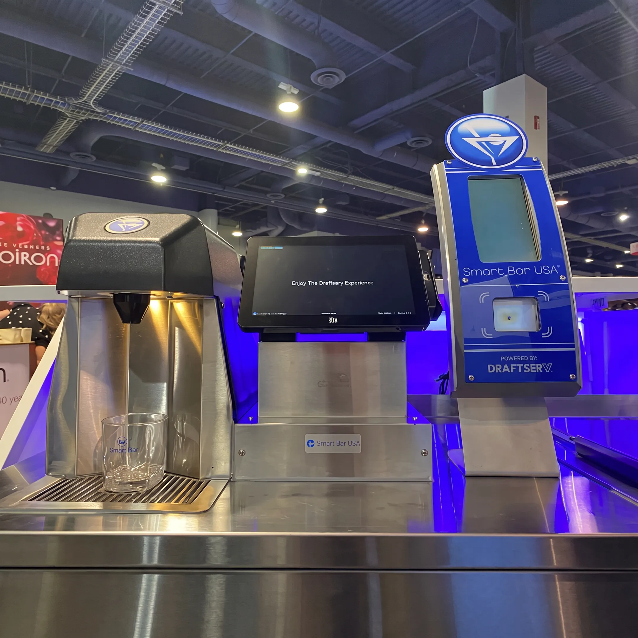 Smartender automated beverage system integrated into a commercial bar