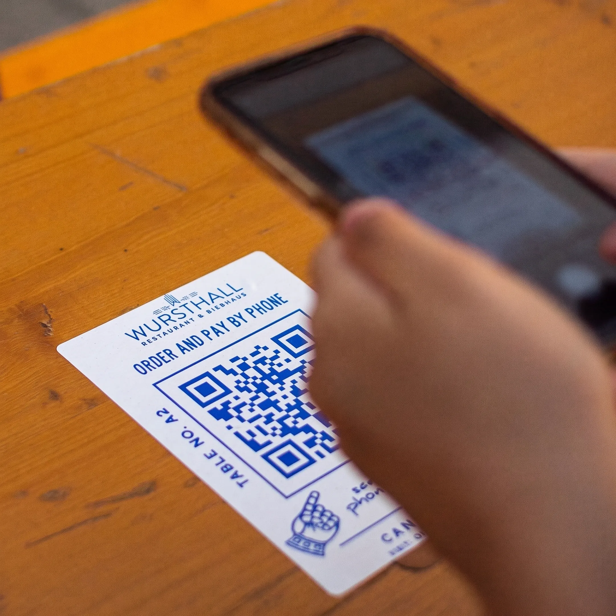 Restaurant table displaying a QR code for mobile ordering