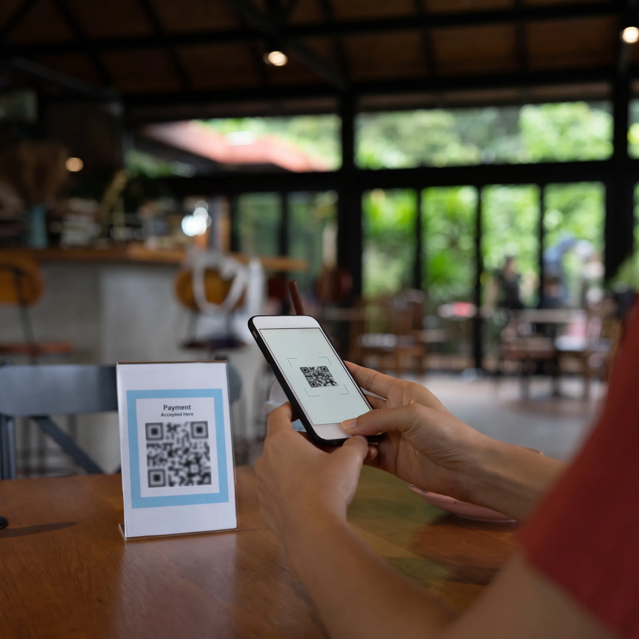 Restaurant table with QR code ordering and served food