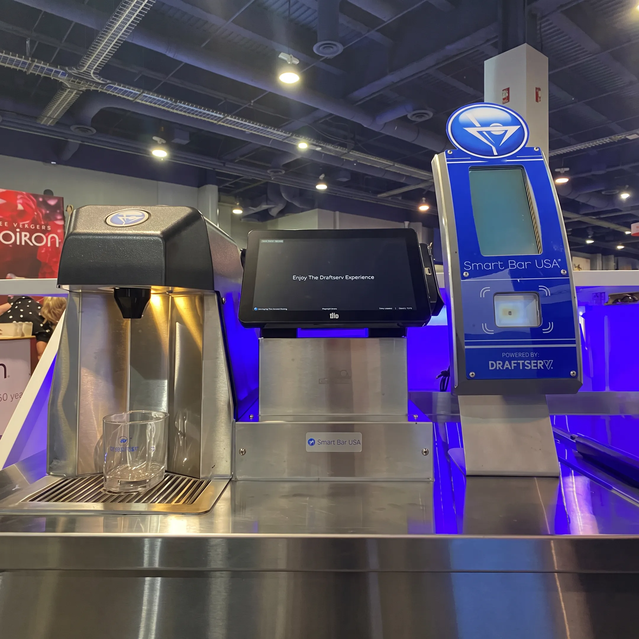 Smartender automated bar dispensing a cocktail