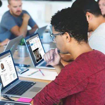 Remote recruiting team reviewing candidate profiles