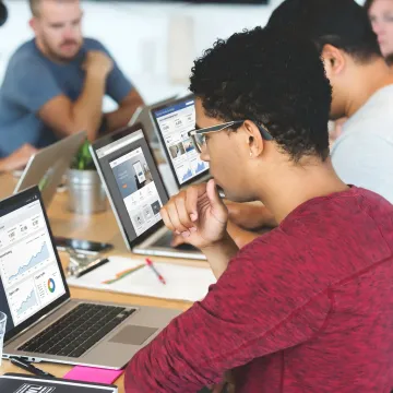 Remote digital marketing team reviewing campaign performance