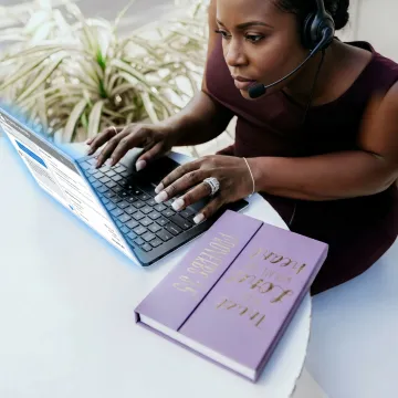 Remote customer service assistant helping a customer
