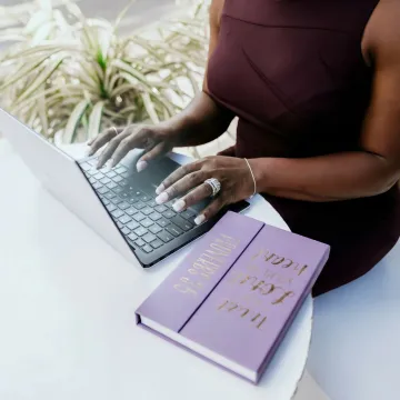 Real estate assistant reviewing transaction workflow