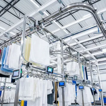 Modern automated laundry facility with advanced sorting and tracking systems