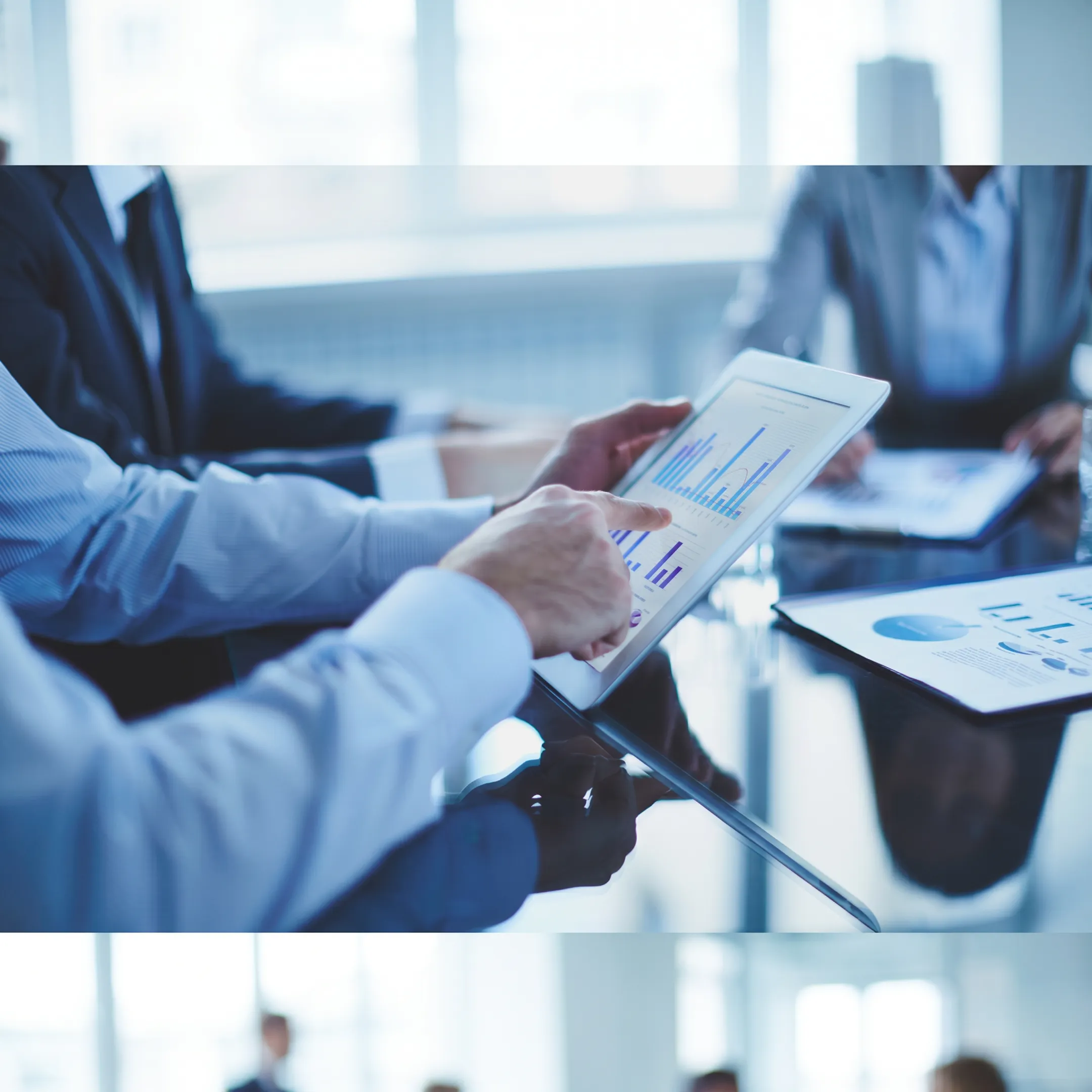 IT staffing consultants collaborating with business leaders in a modern Atlanta office