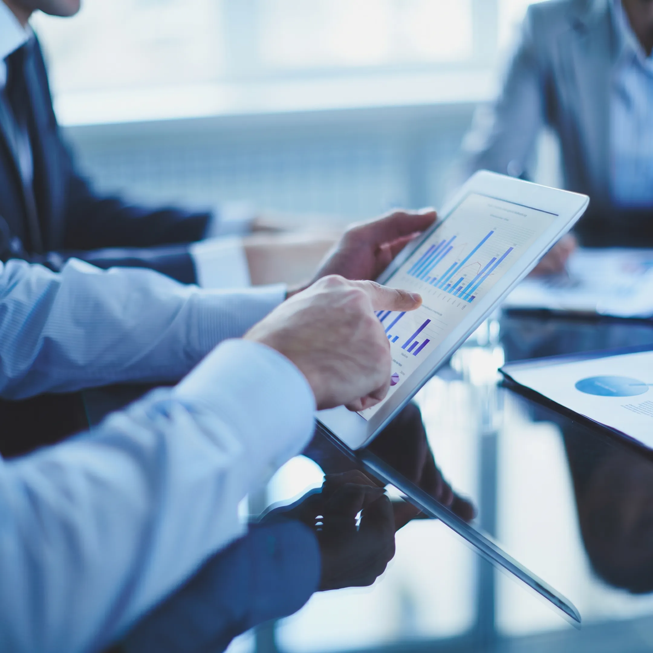 Technology staffing professionals collaborating with business leaders in a modern San Diego office