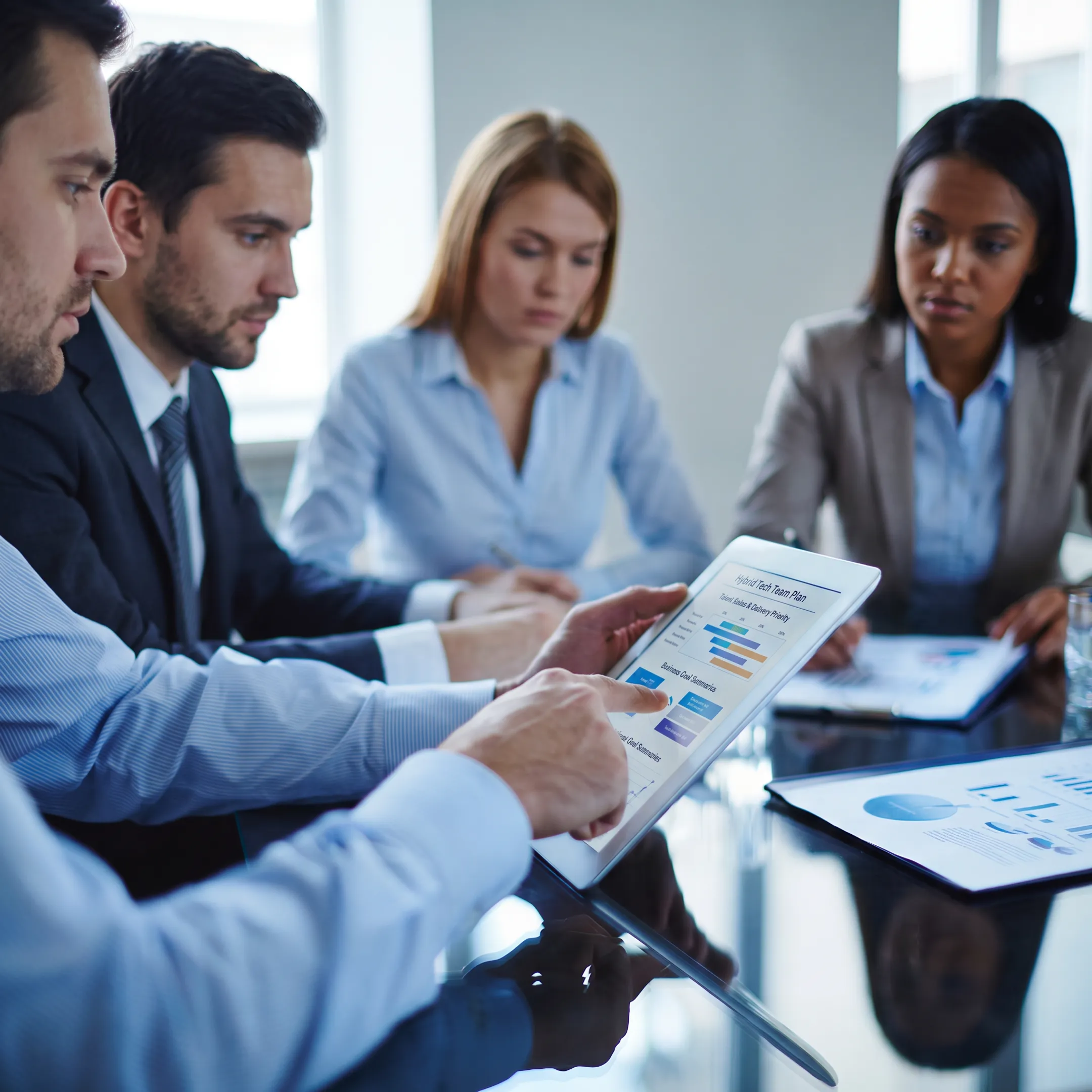 IT staffing advisors discussing a hybrid technology team plan
