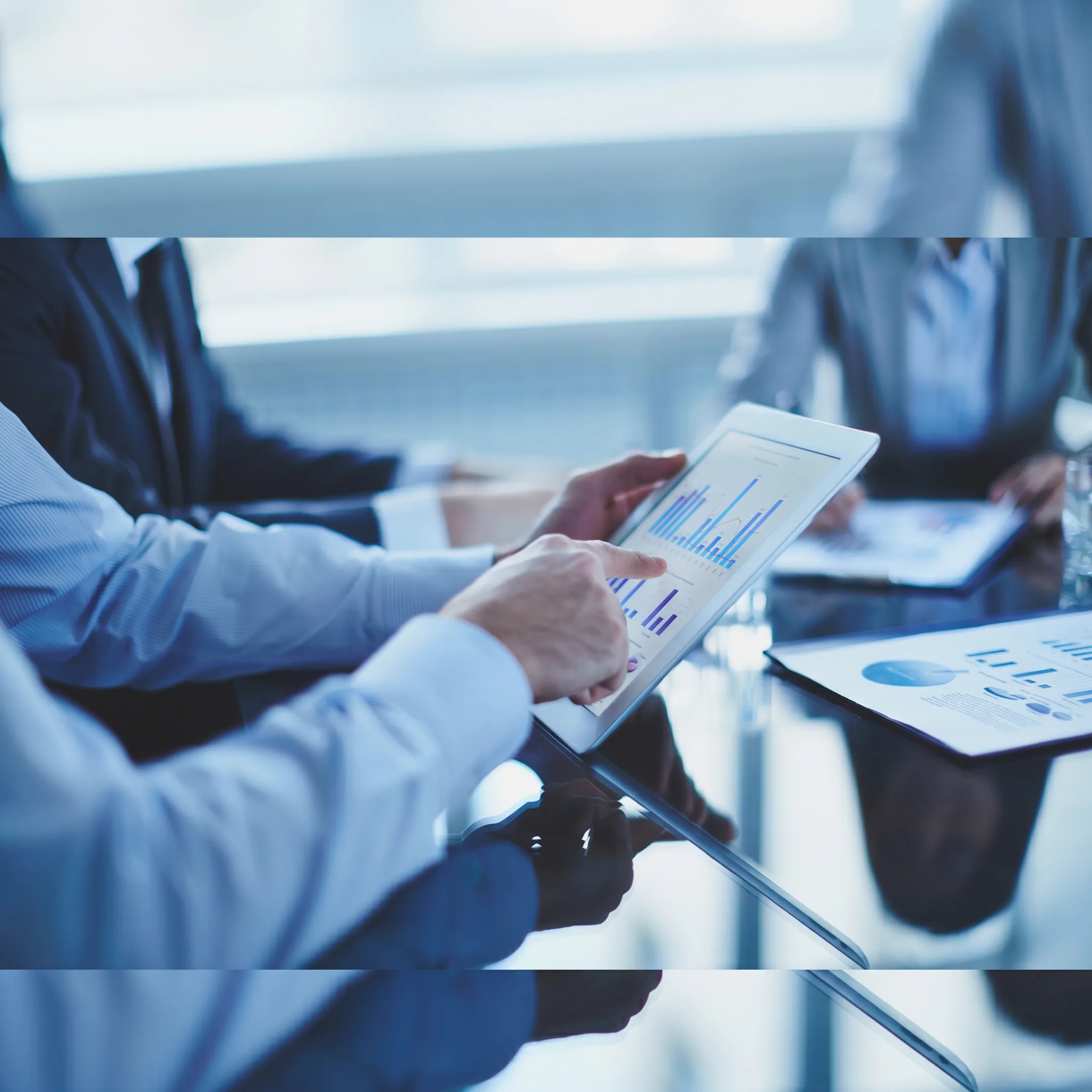 Technology staffing professionals collaborating with business leaders in a modern Philadelphia office