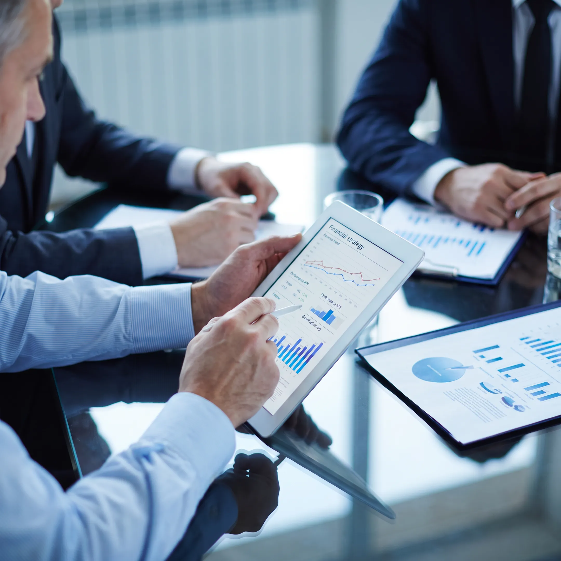 CFO presenting financial strategy to business leaders