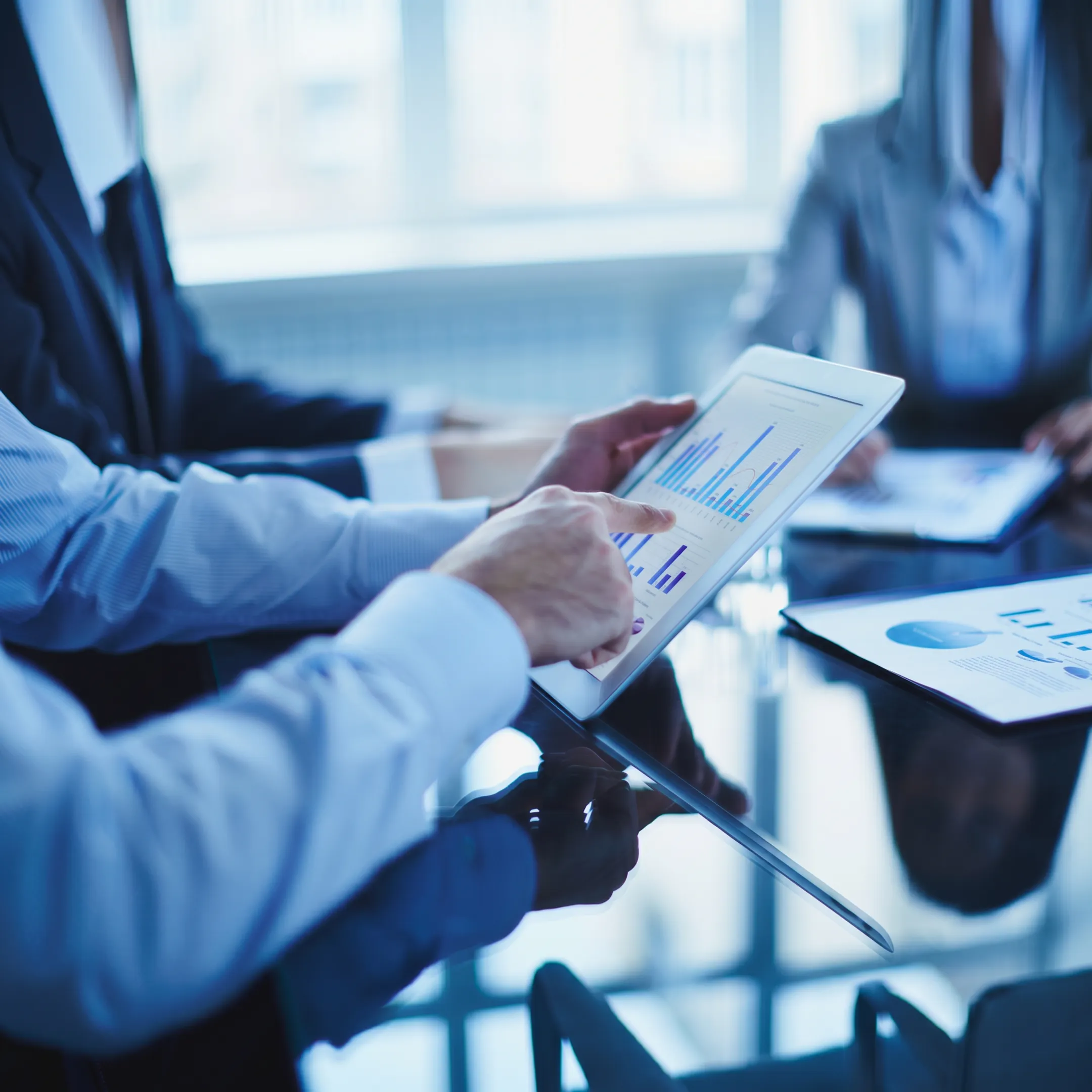 IT staffing professionals reviewing candidate profiles with a Phoenix business team