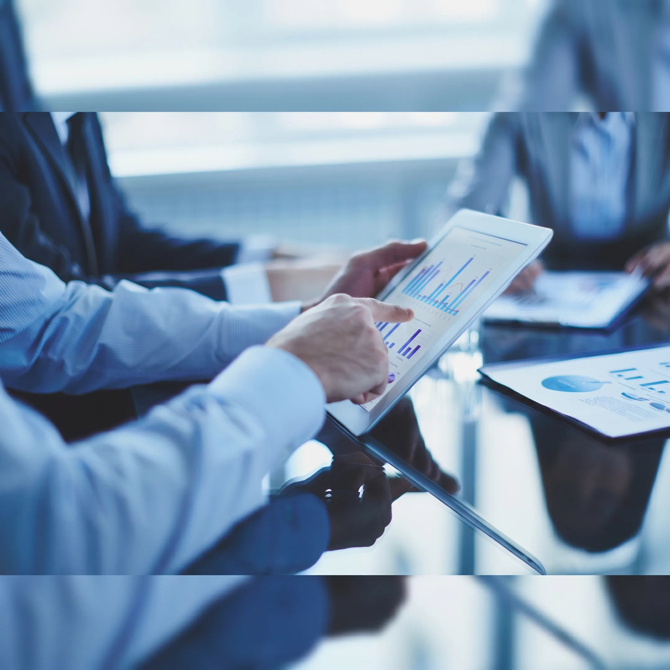 Consultant presenting an IT outsourcing strategy with technology dashboards
