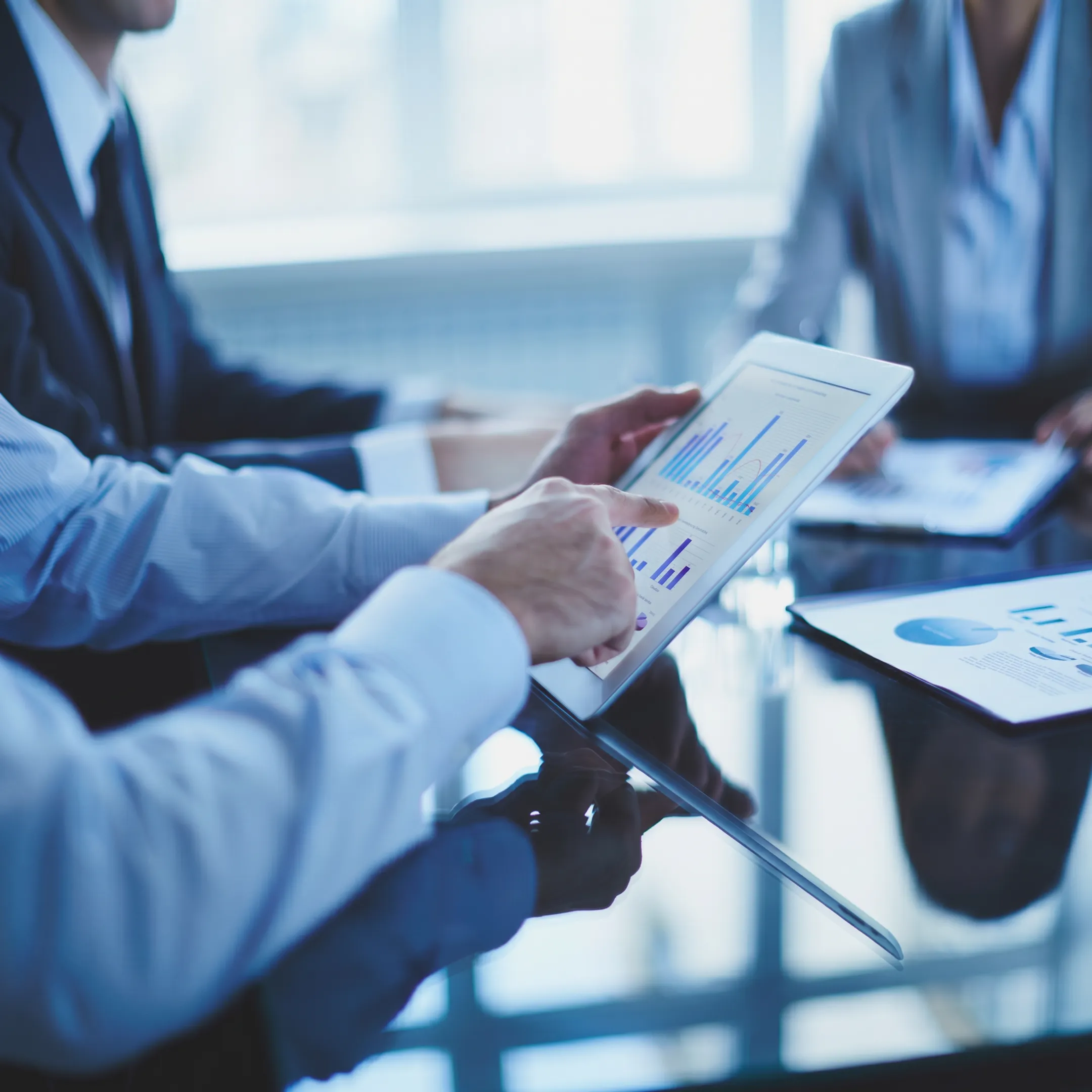 Technology staffing professionals reviewing a project delivery plan