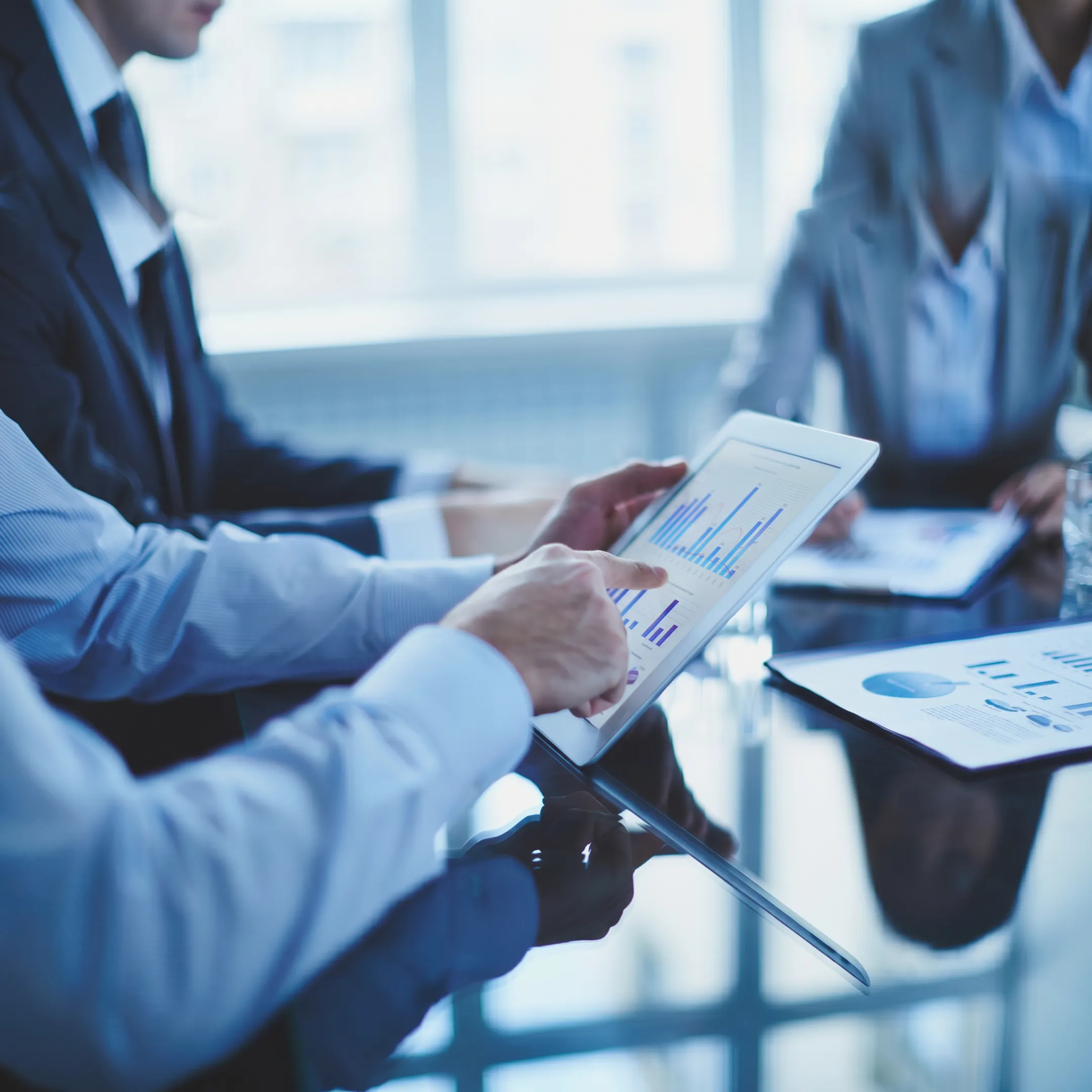 AI staffing specialists reviewing a technology roadmap with a growing business team
