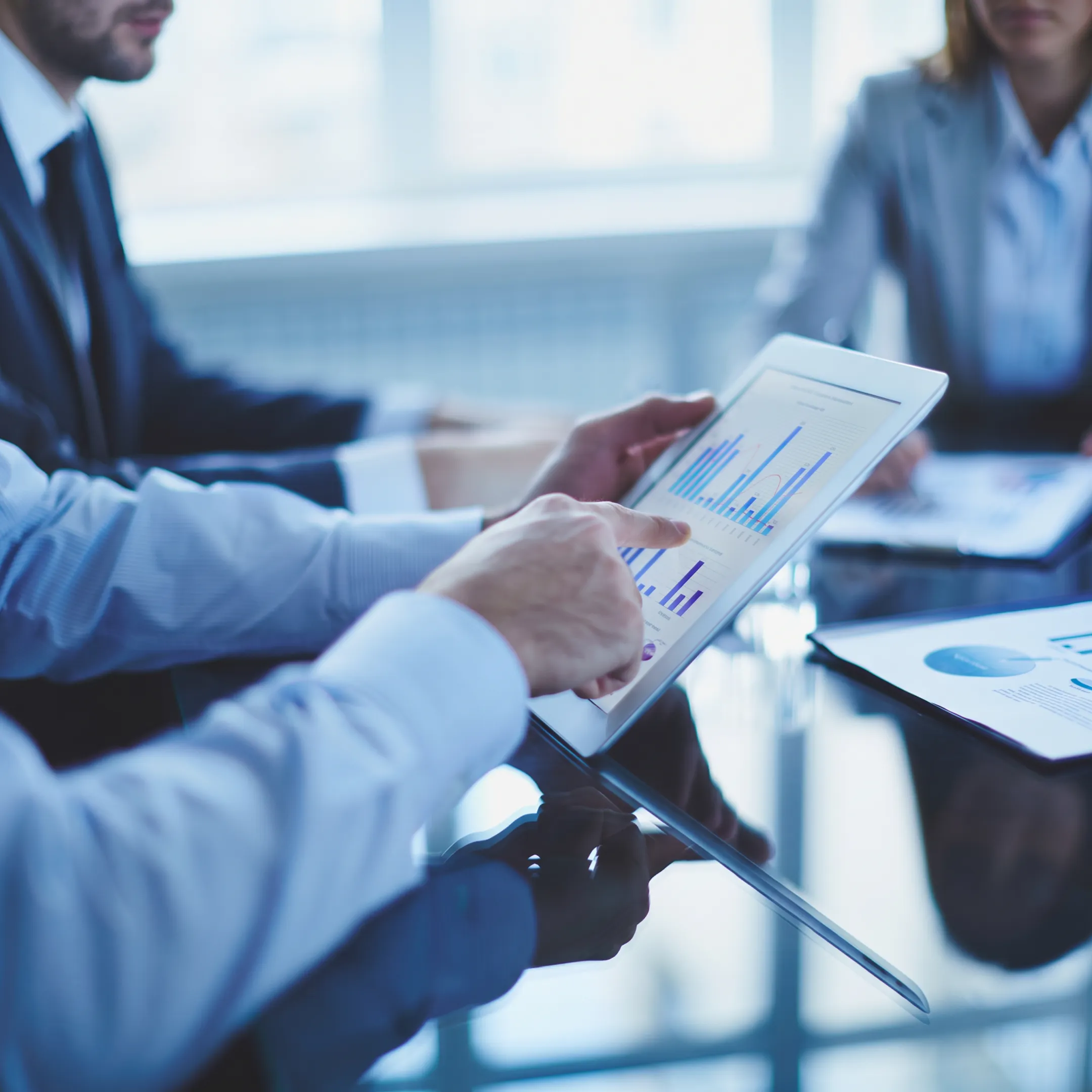 IT consultants reviewing scalable technology solutions