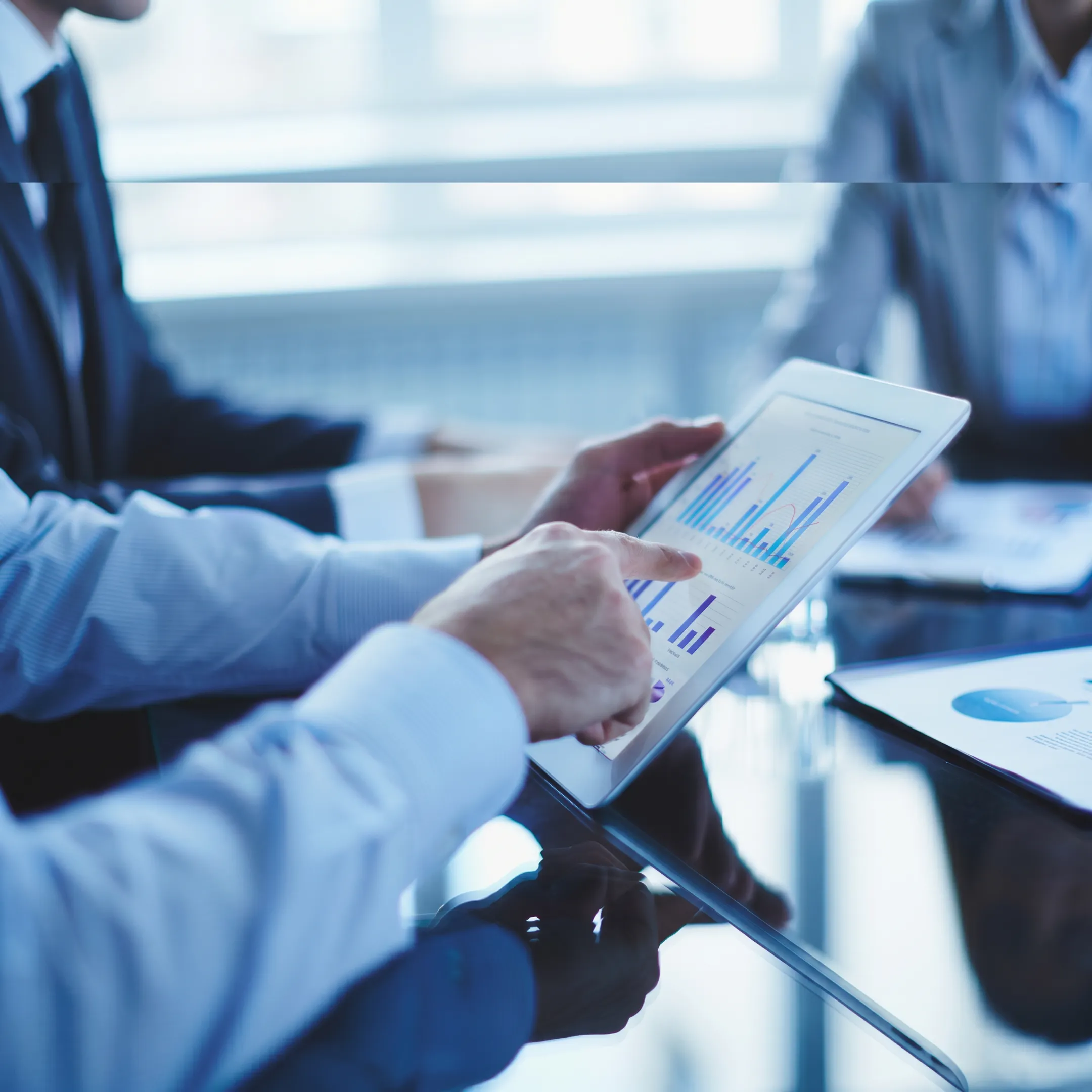 Technology consultants collaborating on an IT outsourcing strategy