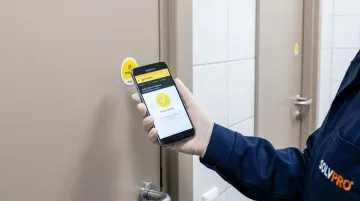 QR code scanning for janitorial proof of service verification at commercial facility